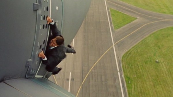 Tom Cruise hanging on plane Rogue